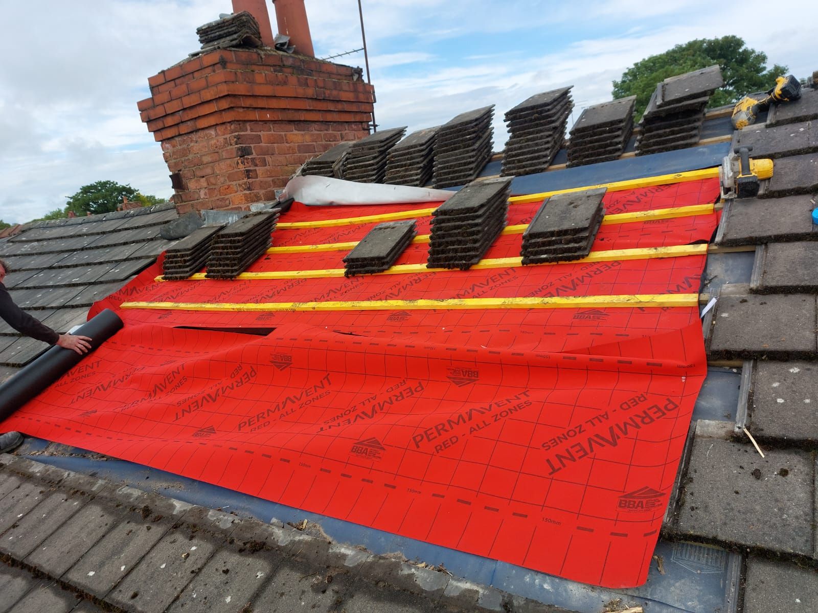 New underlay and battens with re-pointed chimney stack