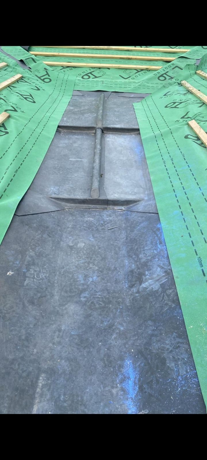 New lead valley and flat roof detail