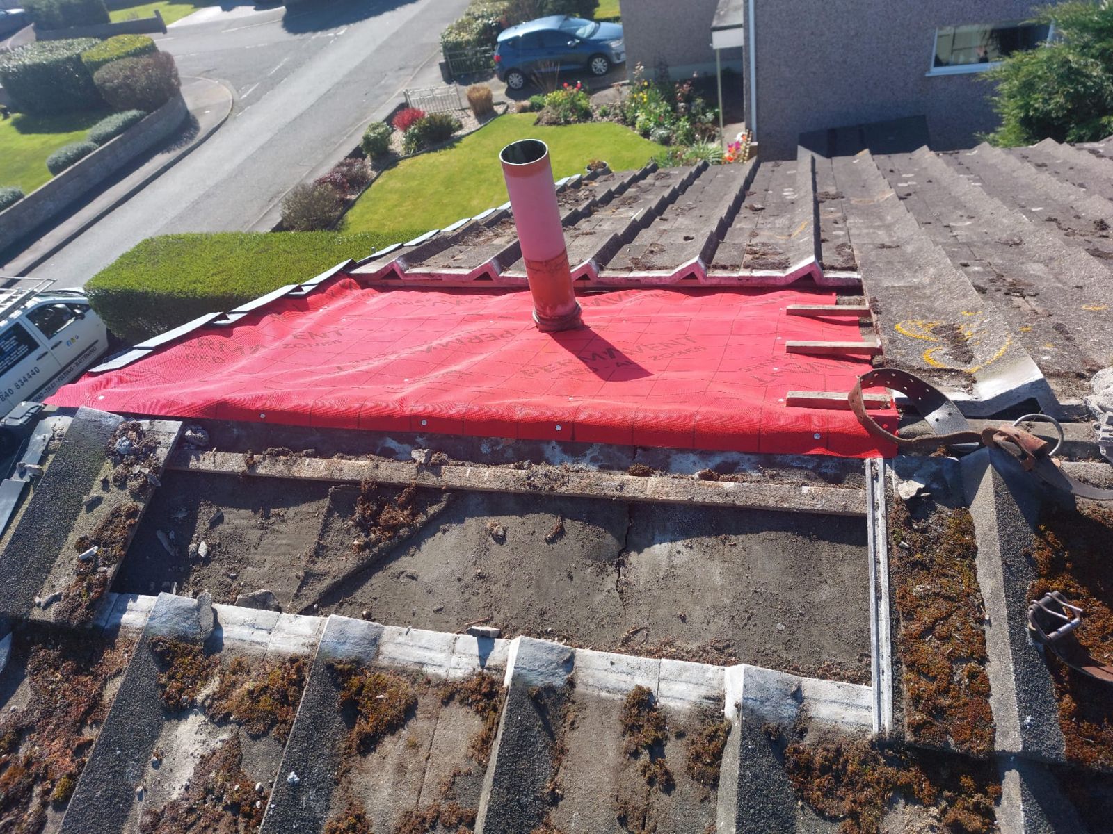 New underlay and battens around a chimney stack