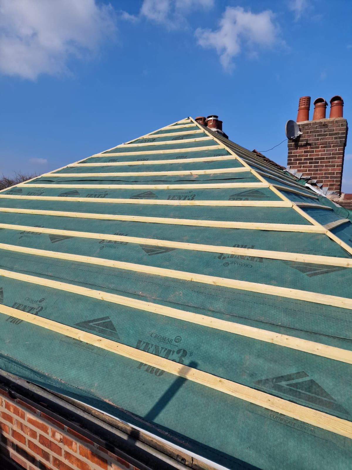 New membrane and battens on a hip roof