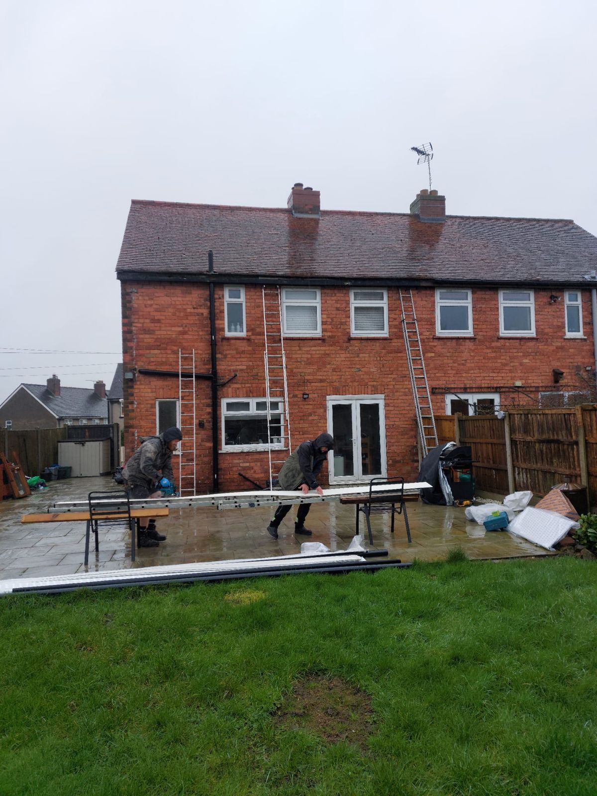 Semi-detached roof works with access ladders
