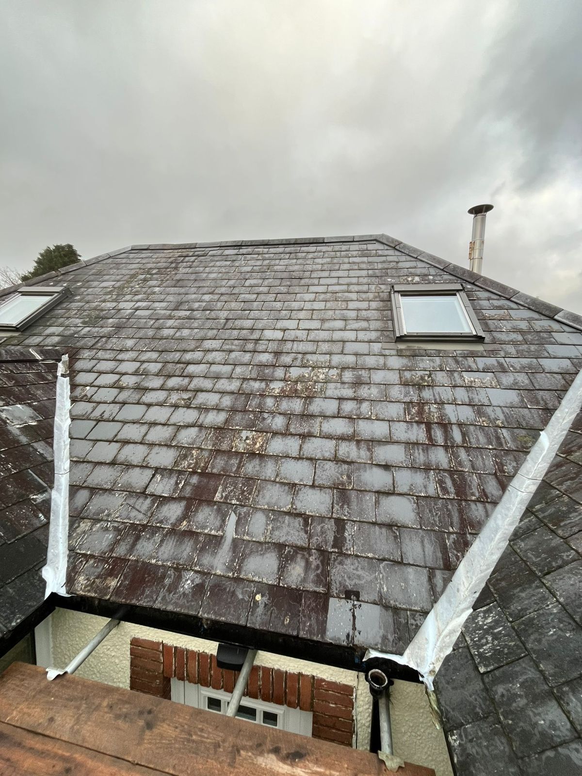 Old cedar shingle roof before replacement